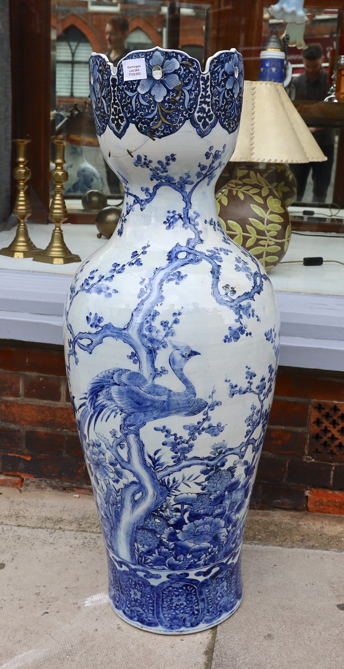 A large Chinese blue and white vase with lobed pierced rim, decorated with exotic birds on prunus branches, height 108cm (a.f)